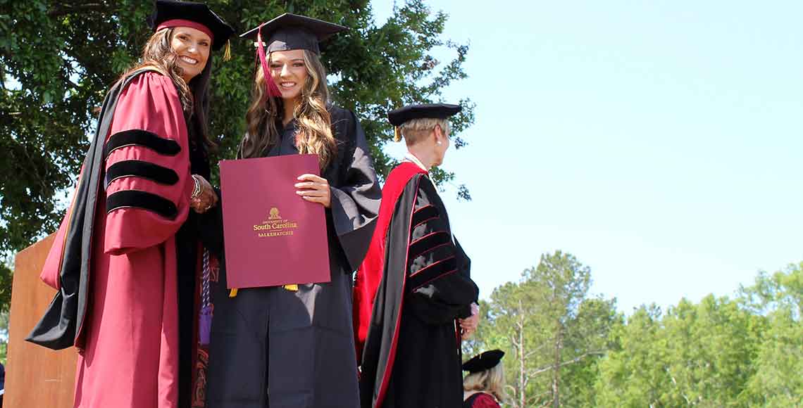 Graduate embracing father. I am Salkehatchie.  