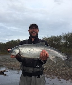 image of bruce holding a salmon