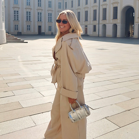 Emma Hampton poses outside a building
