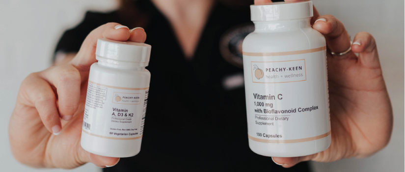Hands holding pill bottles